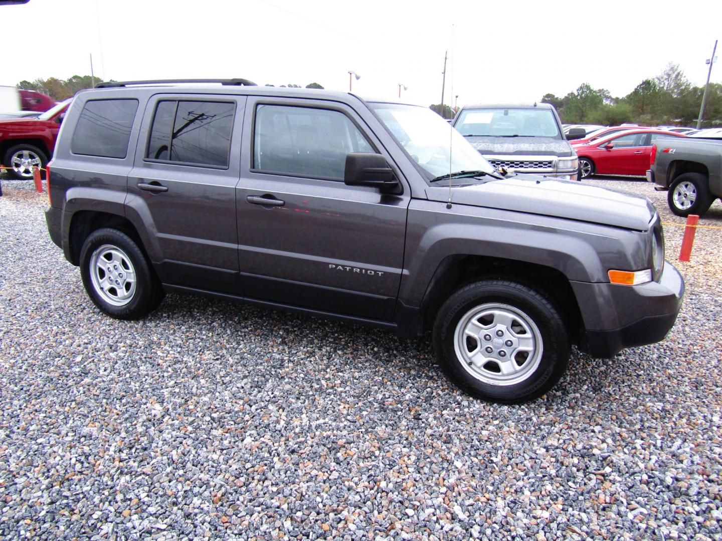 2016 Gray /Gray Jeep Patriot (1C4NJPBBXGD) , Automatic transmission, located at 15016 S Hwy 231, Midland City, AL, 36350, (334) 983-3001, 31.306210, -85.495277 - Photo#0